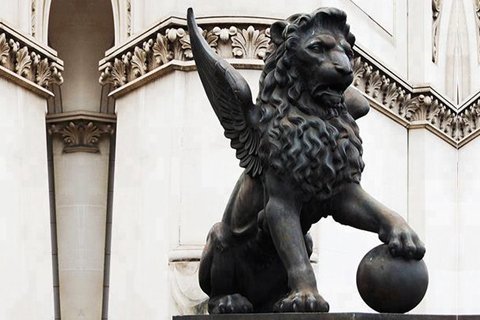 Large bronze winged lion garden sculpture with ball for sale